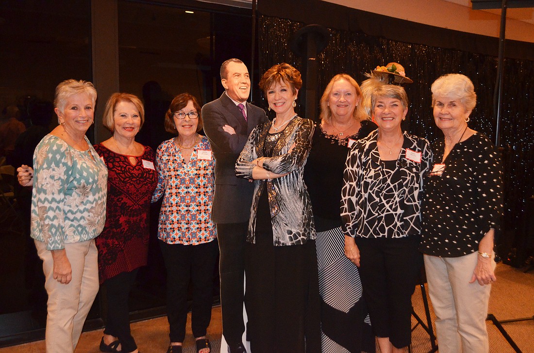 Seaplace planning committee members Kathy Neudorfer, Peggy Jelinek, Gloria Long, performer Marcy Downey, Susan Pariseau, Mary Del Pup and Pat Stusek pose with an Ed Sullivan cutout.
