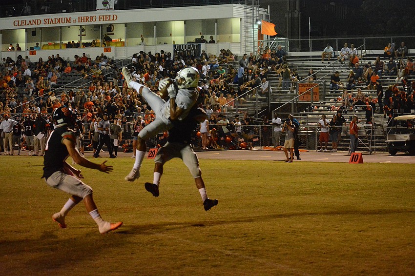 Braden River senior Craivon Koonce skies for his first touchdown catch of the game.