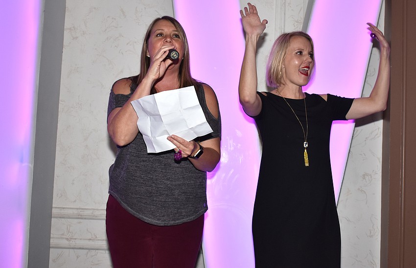 Mary Ellen Mancini and Safe Place and Rape Crisis Center President and CEO Jessica Hays welcome the crowd.