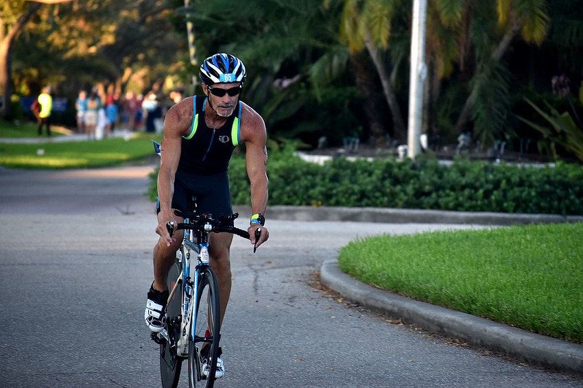 Michael Quigley makes his way to Gulf of Mexico Drive during the biking portion of the Longboat Key triathlon turned duathlon on Oct. 15.