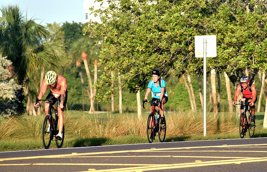 Bikers raced up and down Gulf of Mexico drive during the biking leg of the duathlon.