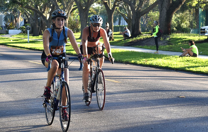 Bikers make their way back to The Resort at Longboat Key Club to transition into the final running leg of the race.