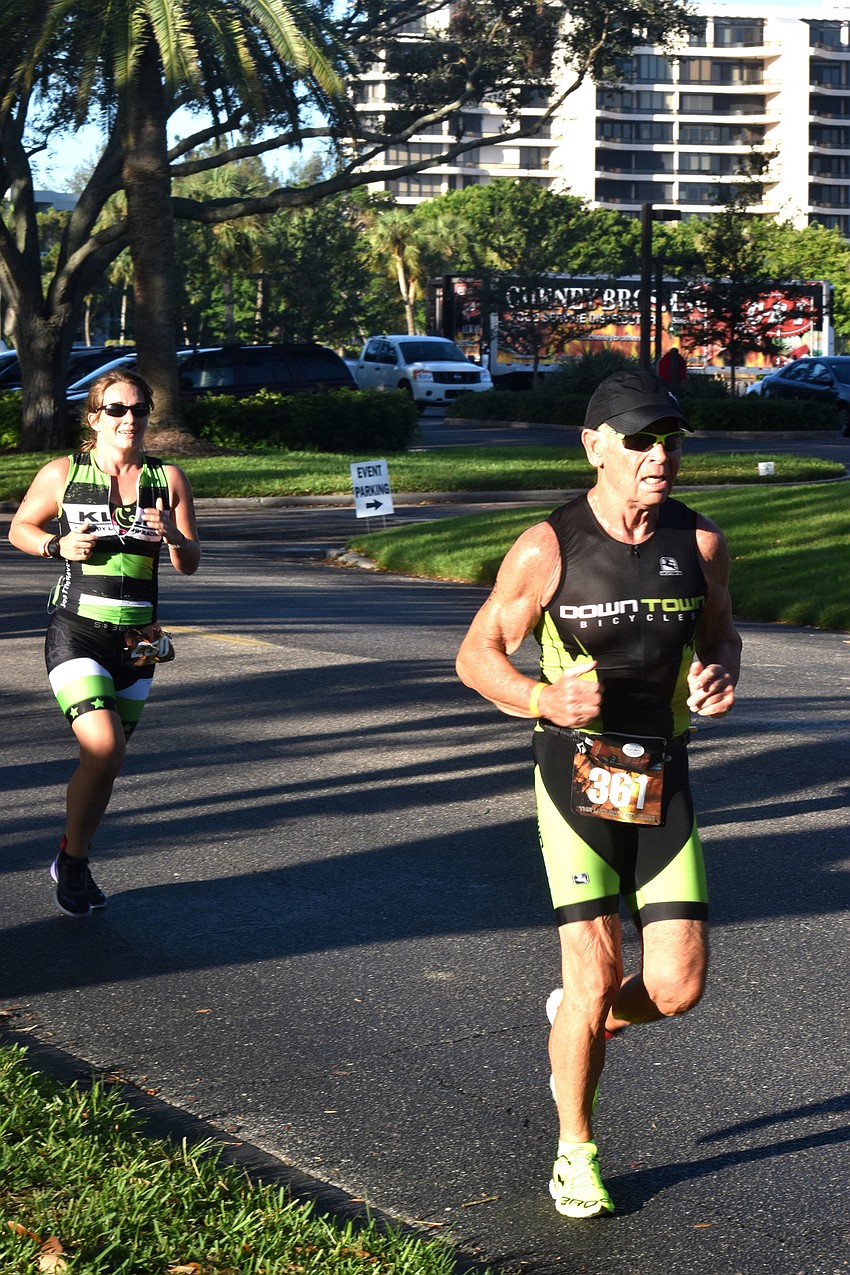 Athletes make their way through the second running leg of the duathlon.