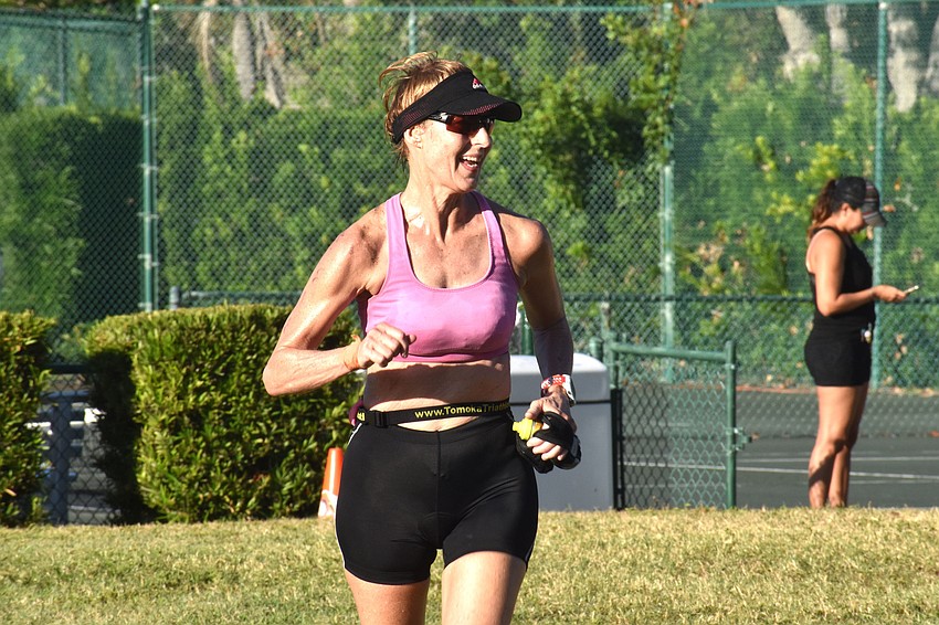 As athletes crossed the finish line they were greeted with a medal and water.