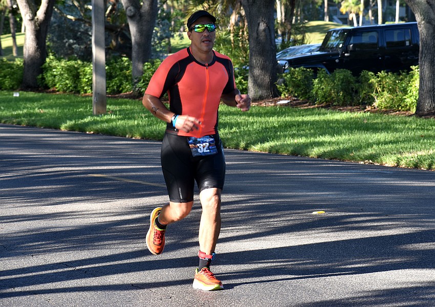 Nelberto Caravaca races to the finish line of the international duathlon.