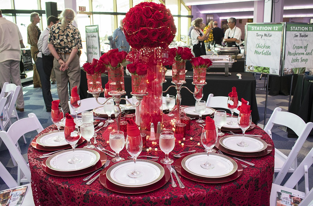 Table 10 guests decided to go romantic with the rose decor they chose for their table at Men Who Cook and Brew on May 21 at Mattisonâ€™s Bayside at Van Wezel Performing Arts Hall.