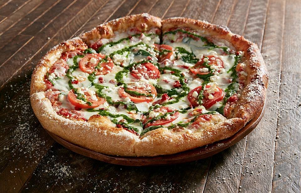 The new restaurant&#39;s menu offers pizza, snacks, salads and a variety of drinks. Photo courtesy Mellow Mushroom.