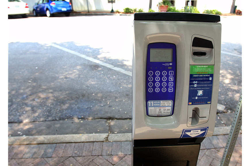 Downtown merchants point to a failed 2011-12 effort to install parking meters downtown to argue against a new paid parking system, but city staff members say they have learned a lesson from that venture.