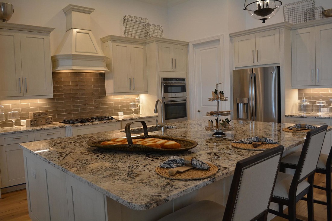 "Meet the Designers" is a Tour of Homes event which will allow visitors to discuss the advantages of quartz countertops as shown in Stock Development&#39;s Clairborne II model in The Lake Club.