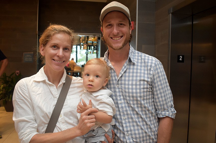 Holly Rolls and Shane Catts with son Maverick of Happy Paddler Kayak Tours and EcoVentures