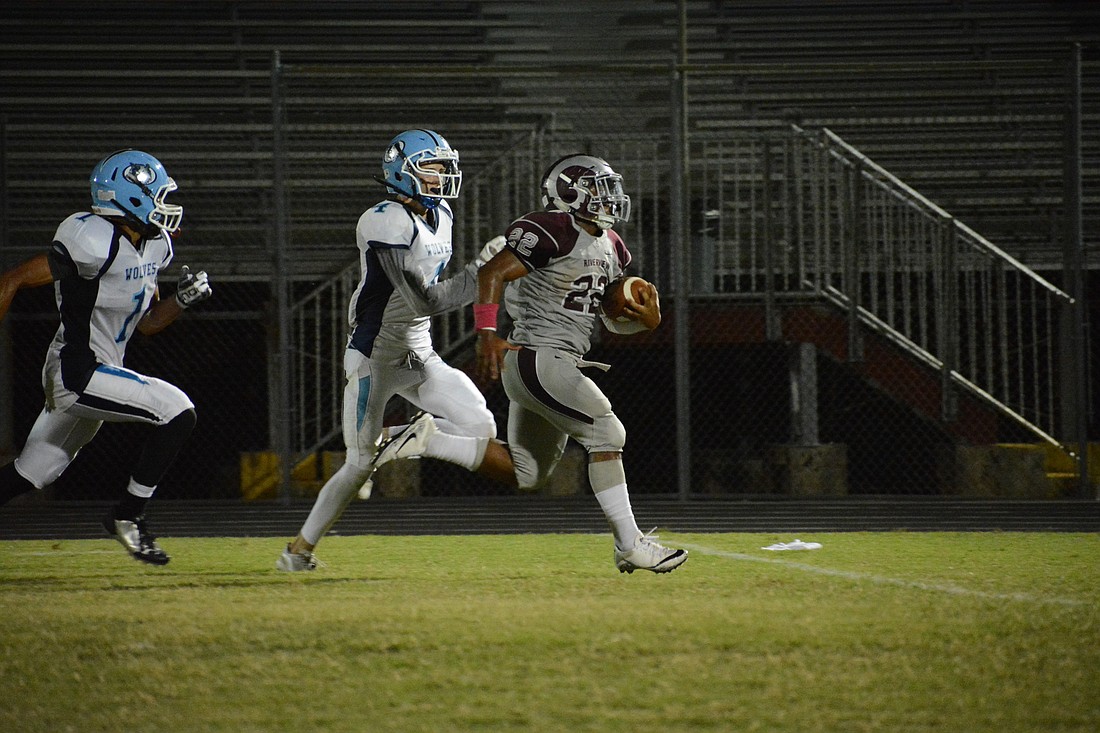 Ali Boyce sprints away from the Newsome High defense.
