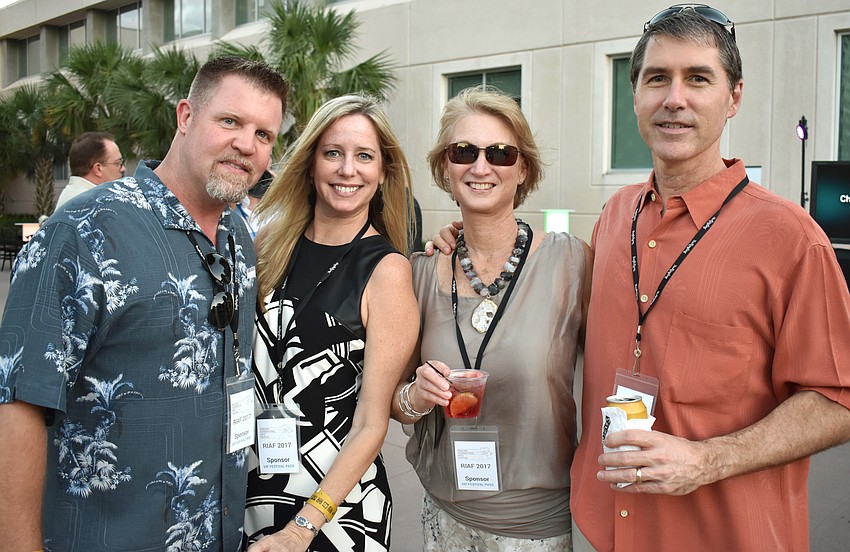 Michael and Amanda Kulaw with Annette and Randy Whitmer