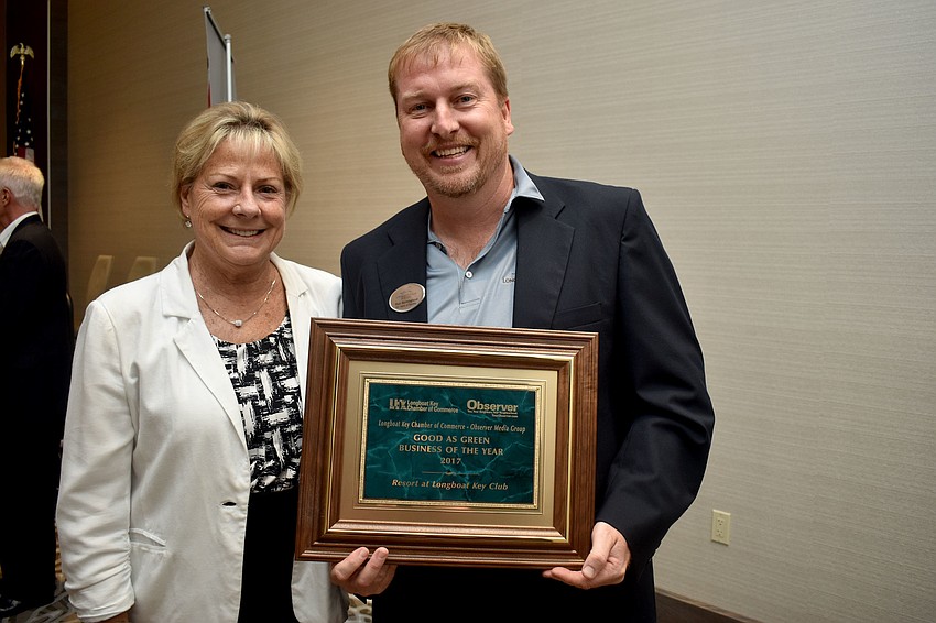 Chamber President Gail Loefgren with Rick Benninghove of Good as Green Business of the Year the Resort at Longboat Key Club