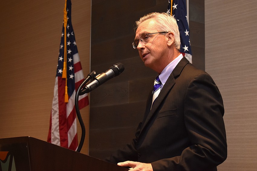 Support sponsor Michael Vejins of Raymond James Financial addresses attendees.