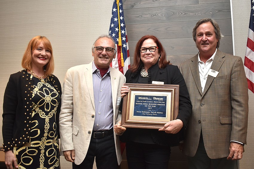 Observer Publisher Emily Walsh, Rookie Small Businessperson of the Year Ferruh Muktar and Susan Robinson of Key Culinary Tours and Chamber Chairman Michael Doll