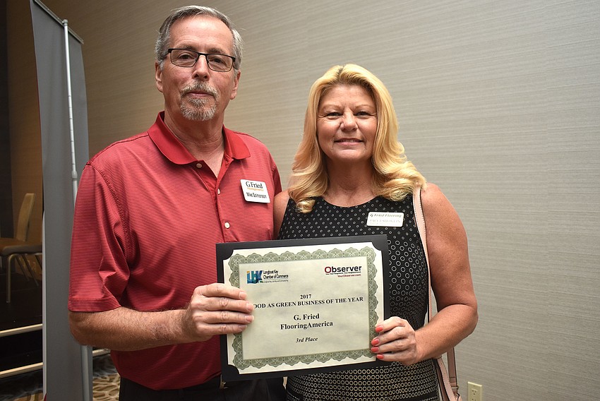 Mike Solmonson of G. Fried Flooring, Third place winner of Good as Green Business of the Year, and Jacci Shovlin