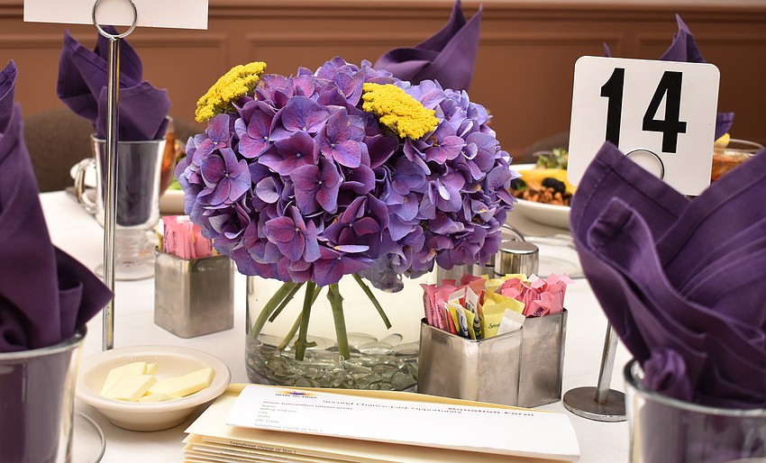 Floral centerpieces adorned every table at the Share the Light Luncheon on Oct. 19 at Michael’s On East.