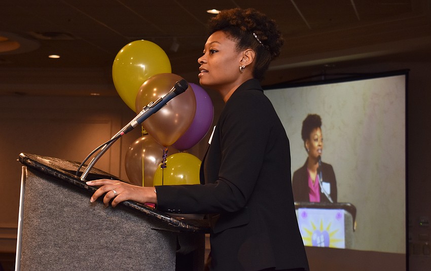 Sha’von Reed welcomes guests to  the Share the Light Luncheon on Oct. 19 at Michael’s On East.