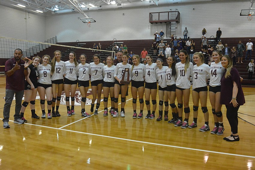 The Rams stand with their district championship trophy following the win. They will host Freedom High (Orlando) Wednesday night in the regional tournament.