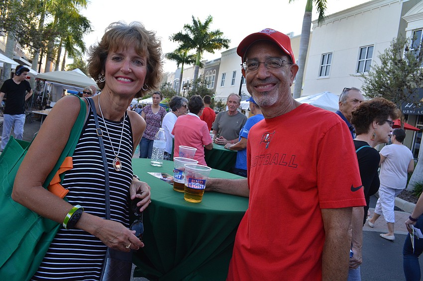 Terri and Stuart Zais, of Esplanade, enjoyed the evening with drinks and visiting vendor booths.