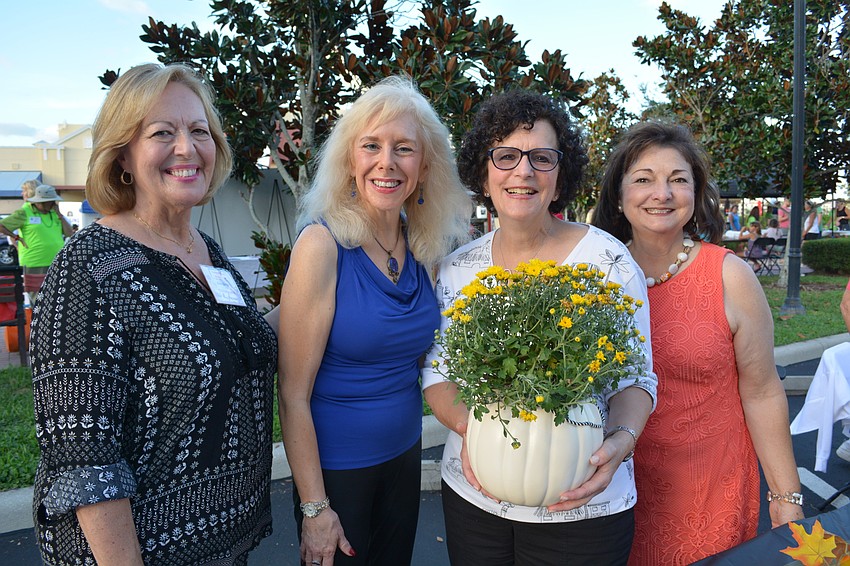 Ann Sledz, Monika Templeman, Helene Levin and Eileen Buzzard promote the Lakewood Ranch Women's Club as part of the Club Day event.