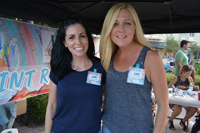 Andrea DeStefano and Kely Granquist, founders of the LWR Kindness Project, put out paint and rocks for children to decorate during Club Day.