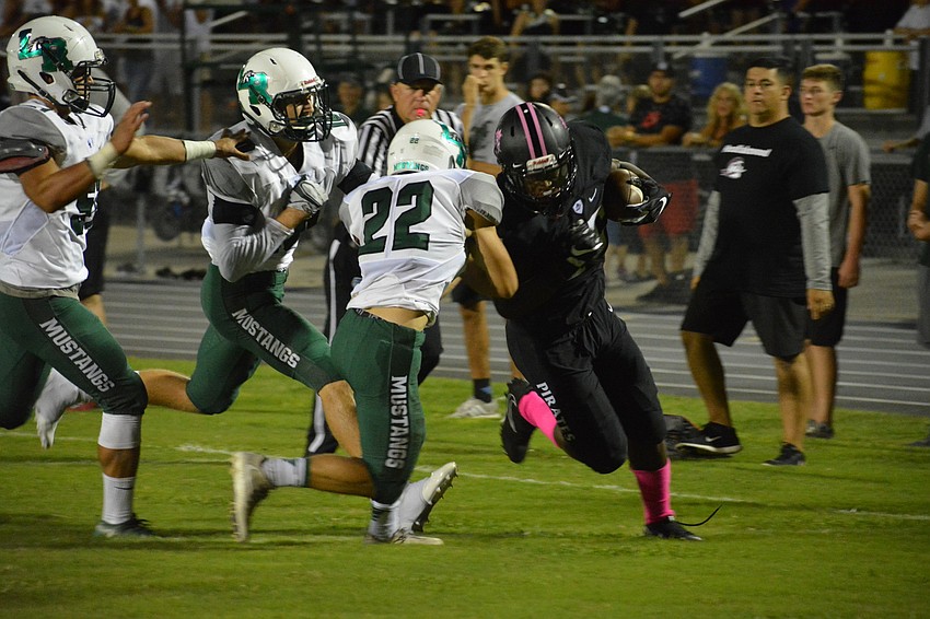 Lakewood Ranch defender J.J. Flahive gets bodied by Braden River's Knowledge McDaniel, who finished with 209 receiving yards.