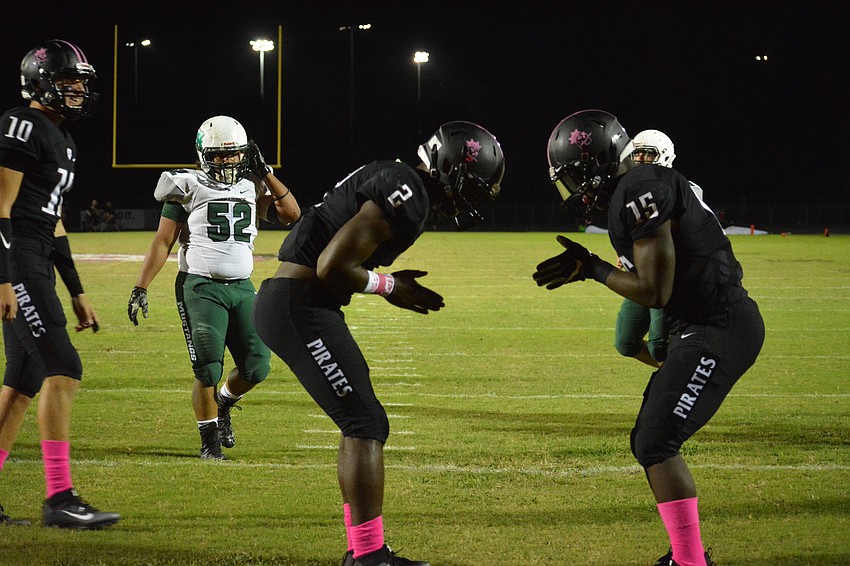 Braden River running back DeShaun Fenwick and wideout Knowledge McDaniel bow to each other following a McDaniel touchdown catch.