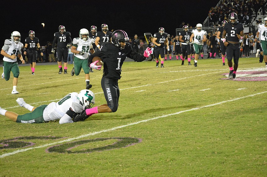 Pirates wideout Craivon Koonce gets tripped before reaching midfield. Koonce had 158 receiving yards overall.