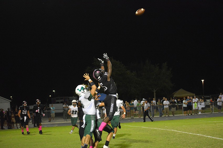 Braden River's Knowledge McDaniel battles Lakewood Ranch defenders for a Hail Mary at the end of the first half. The pass fell incomplete.