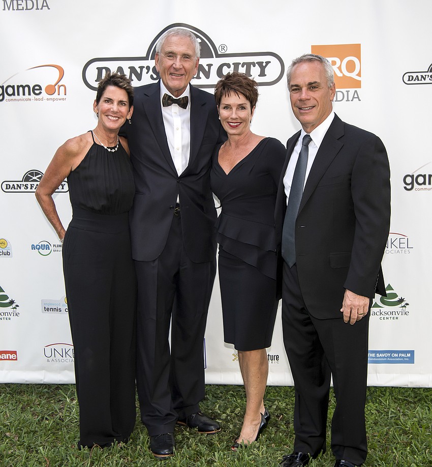 Audrey Robbins and Harry Leopold, together with Holly and Jay Logan