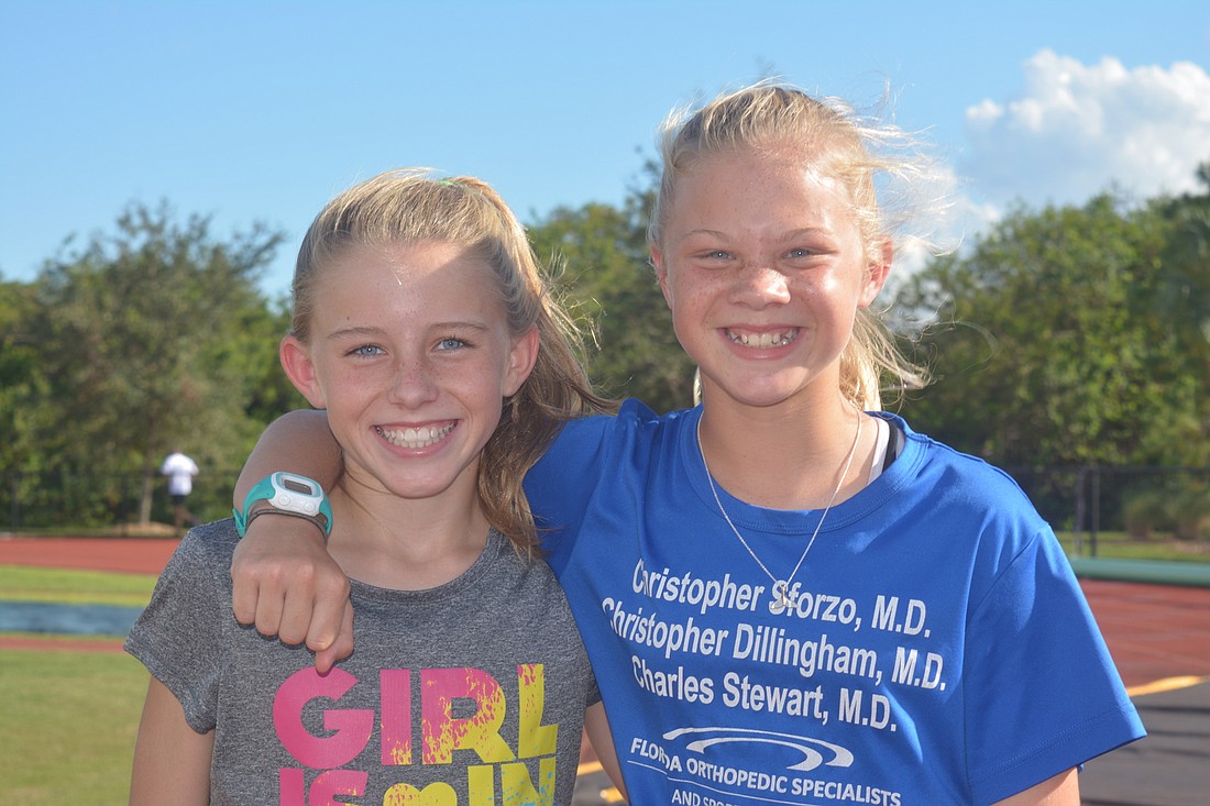 ODA cross country runners Aubrey Robbins and Abbey Burwood, 11,  are beating girls six years older than them.