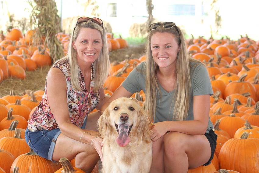 Parrish's Michele and Brianna Blethen with their 2-year-old golden retriever, Marley, loved their time at the festival.