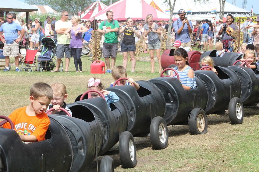 Children get a feel for what it is like behind the wheel.
