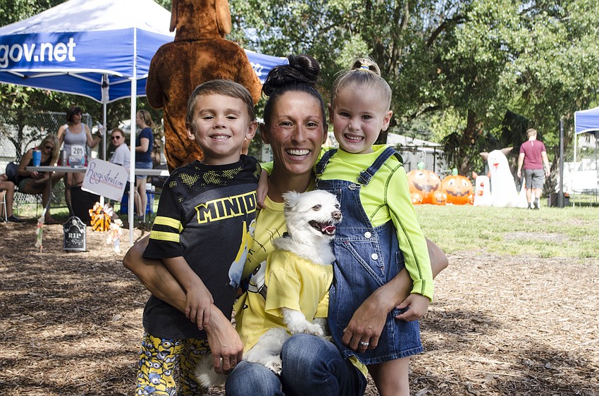 Bowser and his family — Uhtred, Amy and Selkie Garner — won Best Overall Costume for their canine version of a minion.