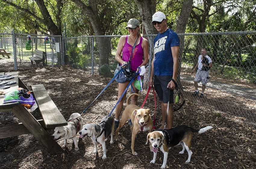 Britta Saemann and Martin Galea check out Bark-O-Ween with Charlotte, George, Chloe and Stella.