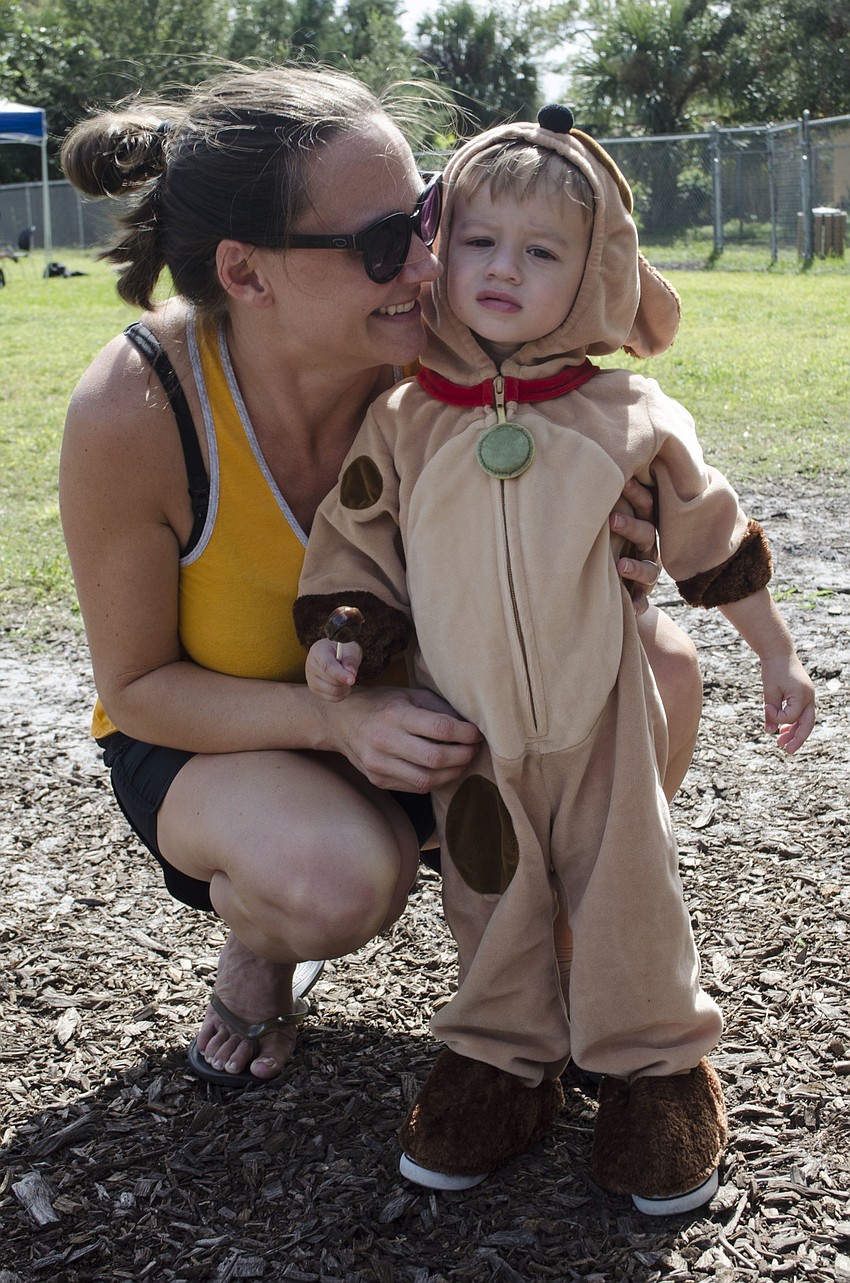 One of these dogs is not like the others... Jamie and Connor Jalwan came to check out the event.
