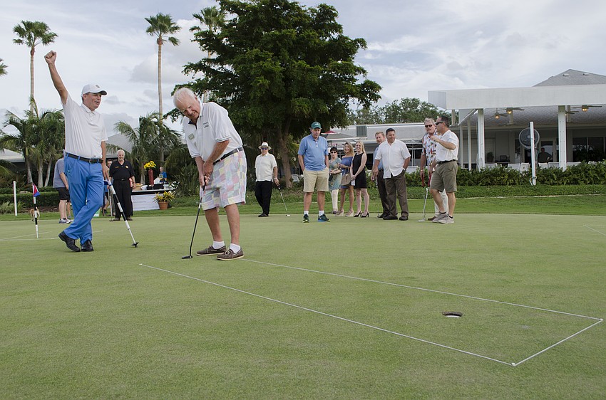 Commissioner Jack Daly (right) putted the best of all of Longboat's officials Saturday, raising $1,300 for the town's emergency services and sinking two of his putts in one stroke.