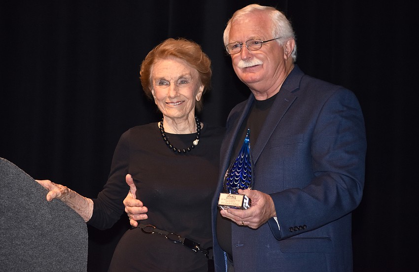 Arts Leadership Award for Philanthropy winner Elizabeth Lindsay shows off her award with Jim Shirley.