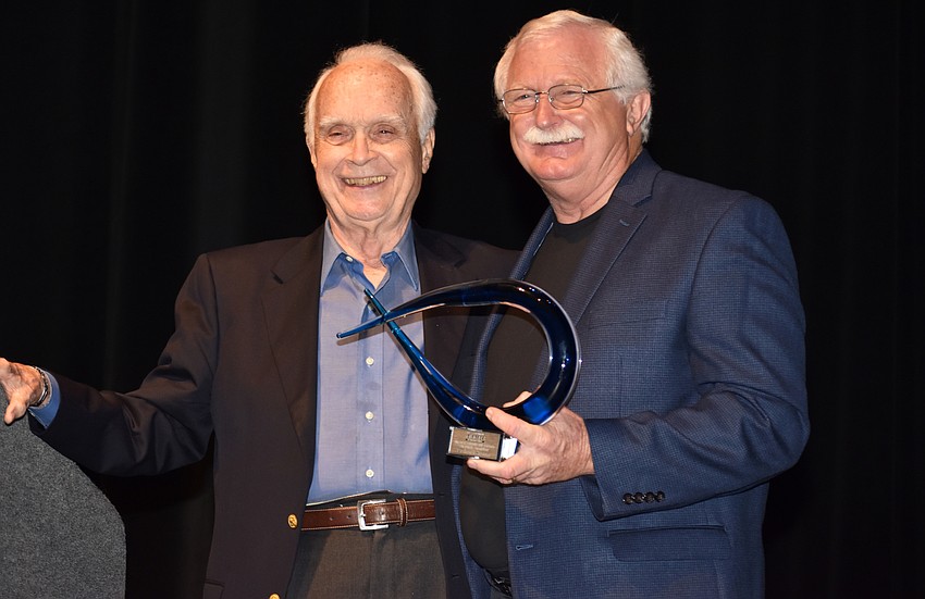 Richard Storm accepts the Arts Leadership Award — Cultural Champion from Jim Shirley.