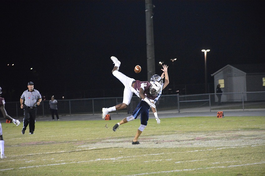 Braden River defensive back Jahvaron Burks breaks up a North Port catch attempt.