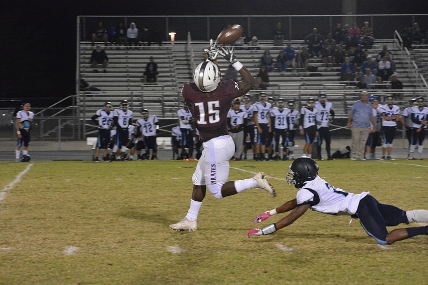 Braden River junior Knowledge McDaniel catches a deep ball from quarterback Bryan Gagg with less than 10 seconds left in the first half. McDaniel would take the ball 78 yards for a touchdown.