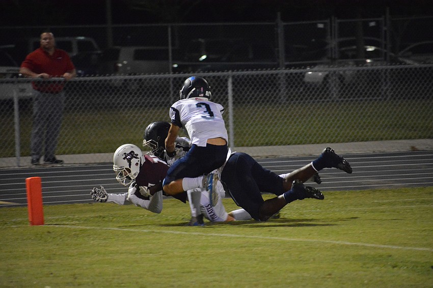 Braden River sophomore Robbie Goecker dives for the pylon and is rewarded with a touchdown.