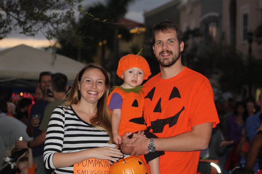 Orange you glad you came to Boo Fest? East County's Leah, Benjamin and Brian Roux were.