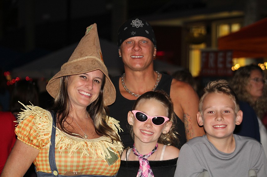 Bradenton's Jackie Spagnolo, Billy Fleese (back), Zoie Logan and Zane Logan were ready to check out the entertainment.