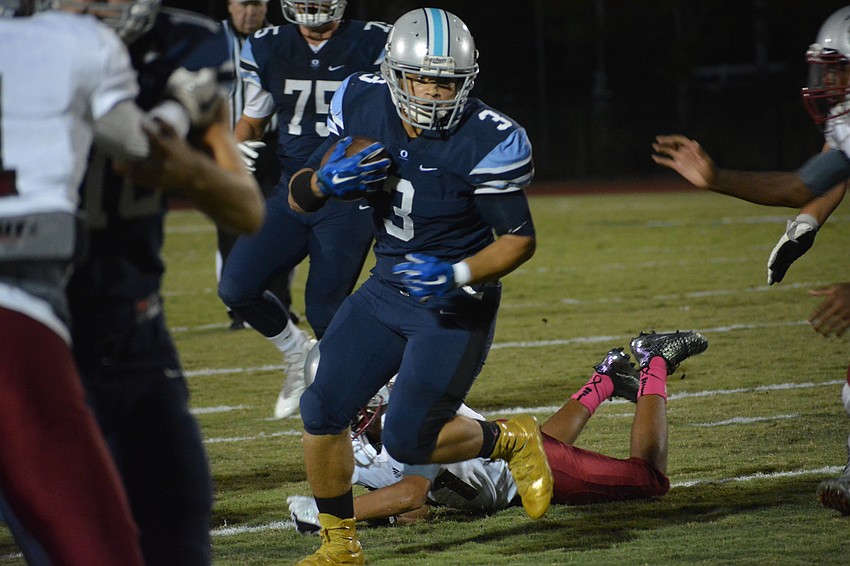ODA running back Dakota Dickerson takes a first-quarter carry up the middle of the field.