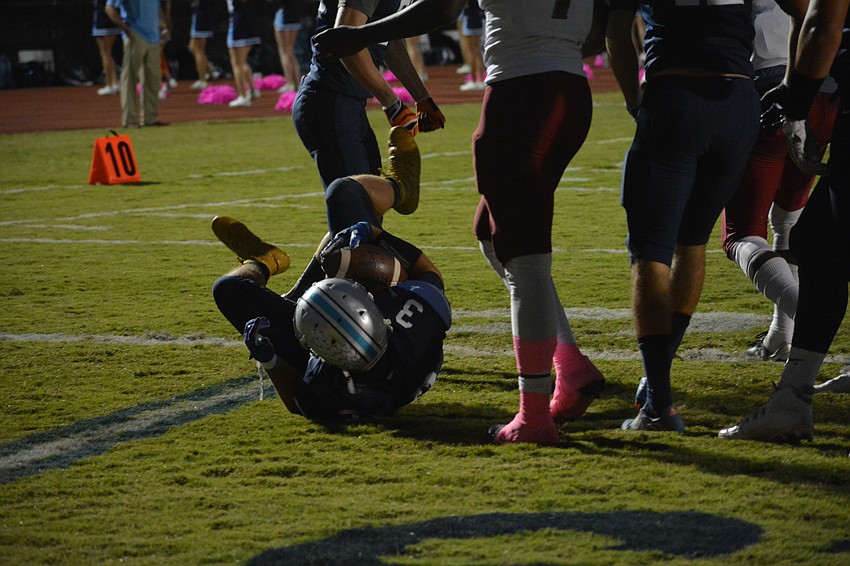 ODA running back Dakota Dickerson scores the first of his four touchdowns on the night.