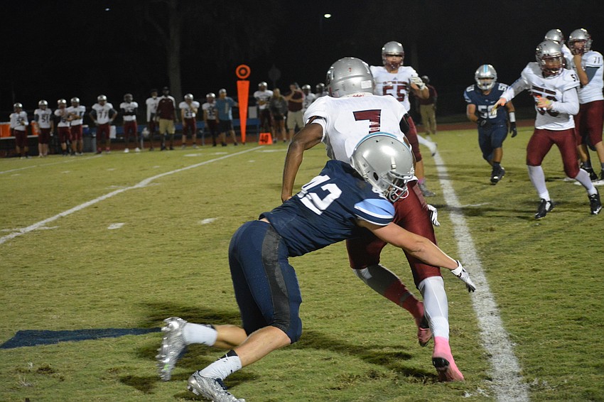 ODa junior Leeland Wheeler stops a Santa Fe running back in his tracks.