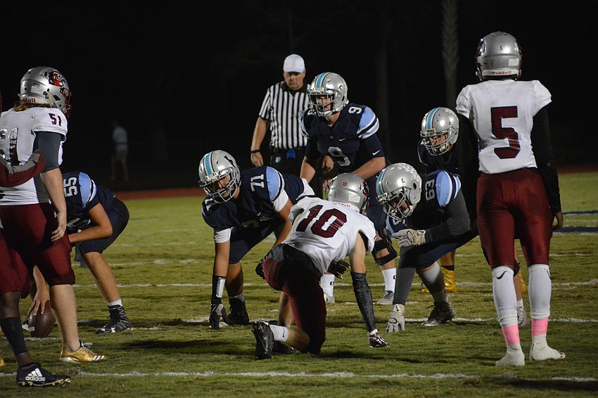ODA quarterback Gus Mahler surveys the field.