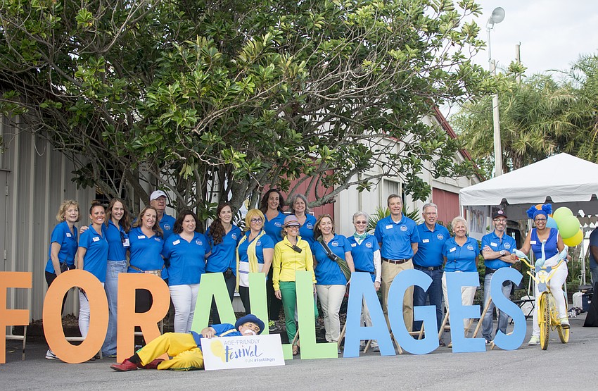Patterson Foundation volunteers pose for a photo during the Age Friendly Festival.